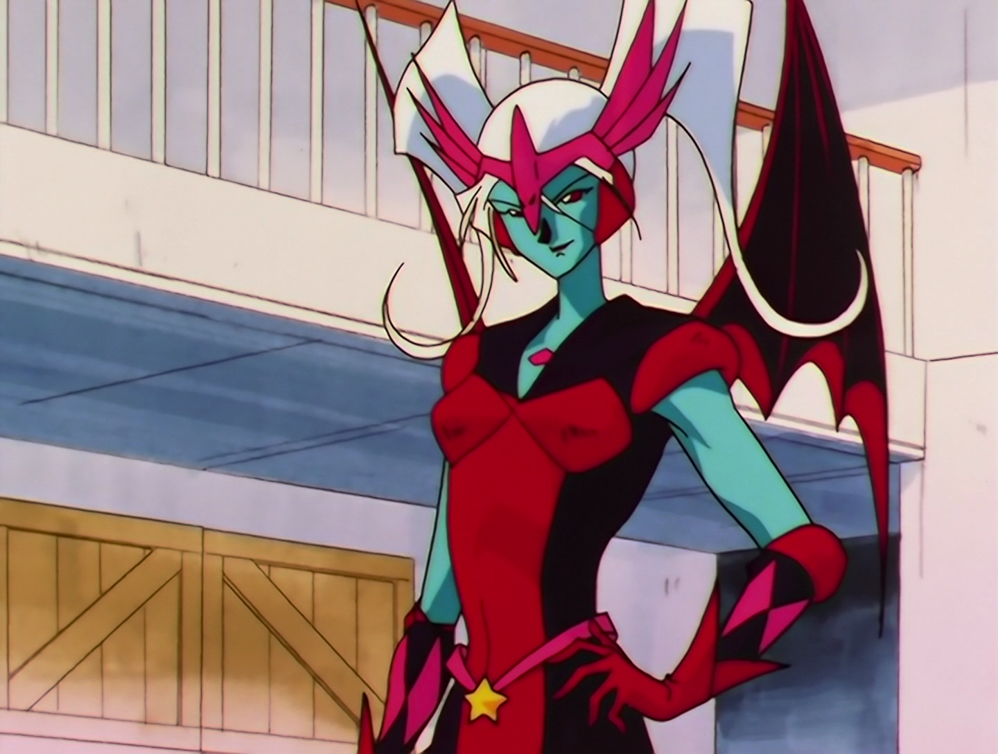 Sailor Gamer, a Phage from Sailor Moon episode 191. She has turquoise skin, which feels like a pattern recently, and white hair. Her outfit is red and black, with large bat wings, and a pink helmet kind of thing that doesn’t really cover her head so much as frame her face.